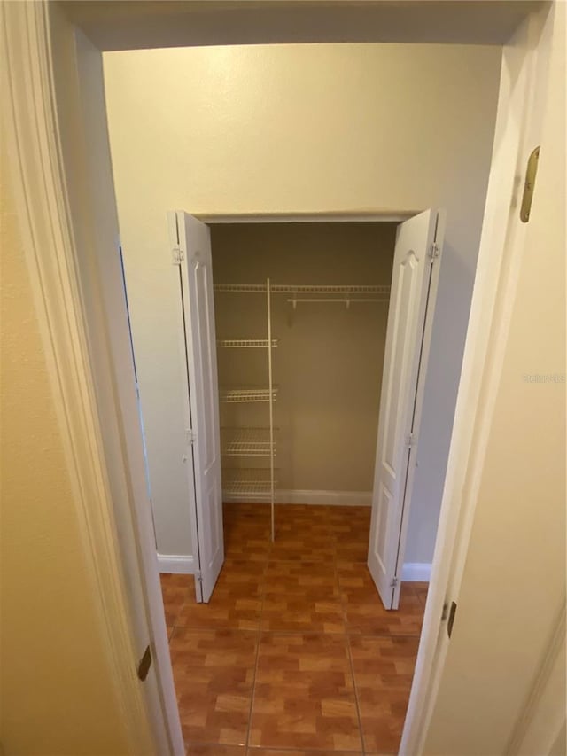 5323 SW 111th Lane Rd, Ocala, FL 34476 - spacious closet with wood finished floors