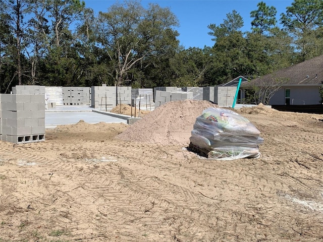 5647 N Summerfield Pt, Citrus Springs, FL 34434 - view of yard featuring view of wooded area