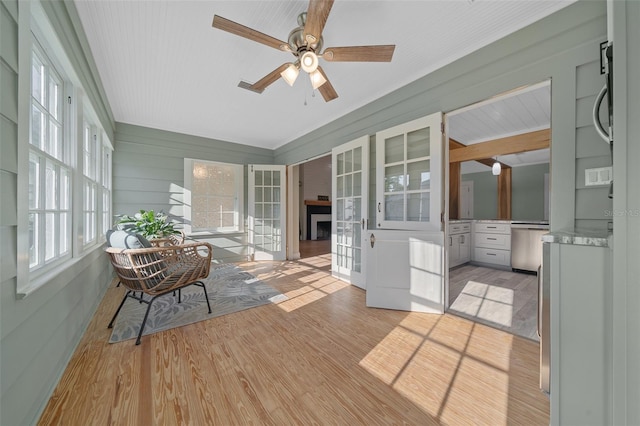 sunroom / solarium with wood finished floors