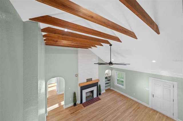 unfurnished living room featuring a fireplace, wood finished floors, baseboards, recessed lighting, and a ceiling fan