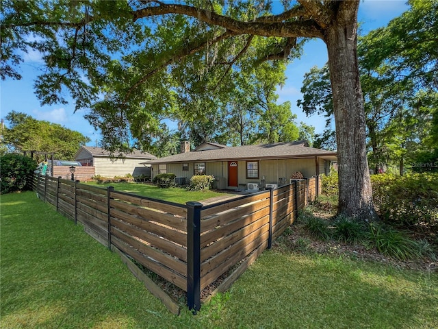 4085 SE 23rd Ter, Ocala, FL 34480 - back of house with a chimney