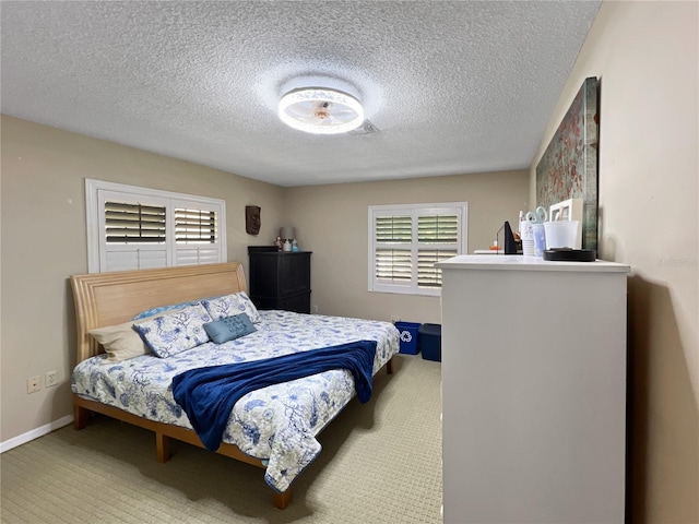 4085 SE 23rd Ter, Ocala, FL 34480 - bedroom with a textured ceiling and carpet floors