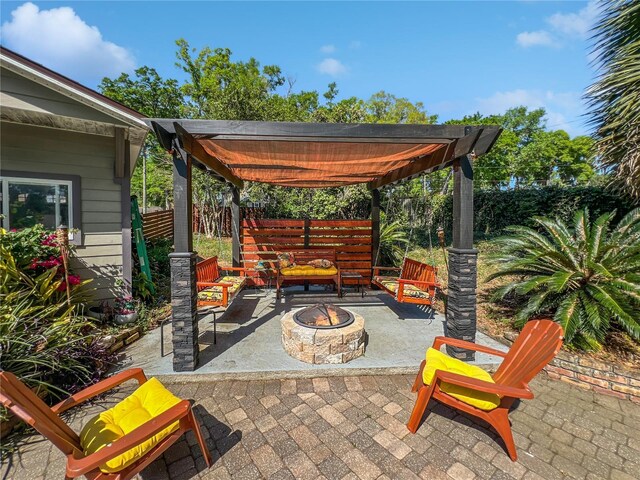 4085 SE 23rd Ter, Ocala, FL 34480 - view of patio featuring an outdoor fire pit and a pergola