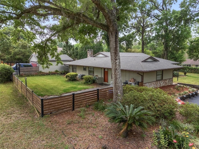 4085 SE 23rd Ter, Ocala, FL 34480 - view of front of property with a chimney and roof with shingles