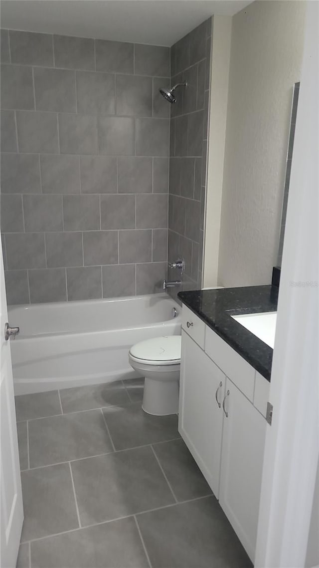 17654 SW 112th Ln, Dunnellon, FL 34432 - bathroom featuring toilet, vanity, shower / tub combination, and tile patterned floors
