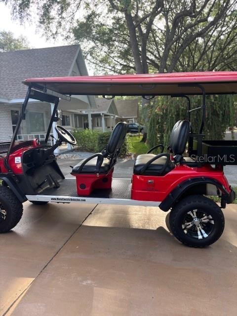 8533 SW 93rd Pl Unit A, Ocala, FL 34481 - view of vehicle parking featuring a carport