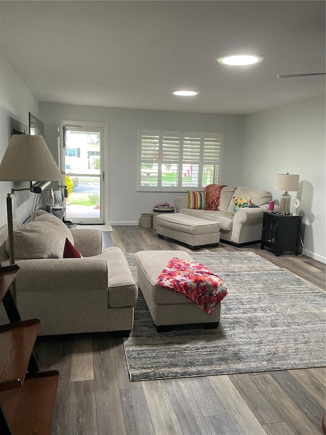 8533 SW 93rd Pl Unit A, Ocala, FL 34481 - living room with wood finished floors and healthy amount of natural light