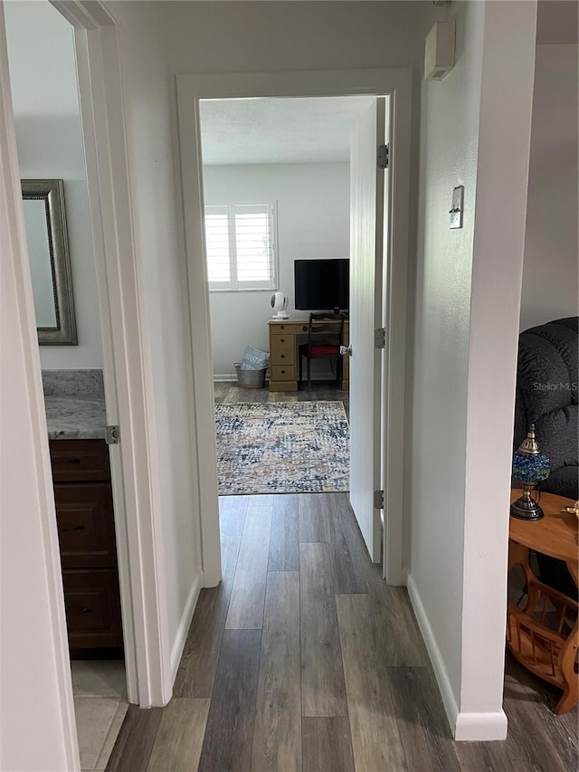 8533 SW 93rd Pl Unit A, Ocala, FL 34481 - hallway with dark wood-style flooring and an office area