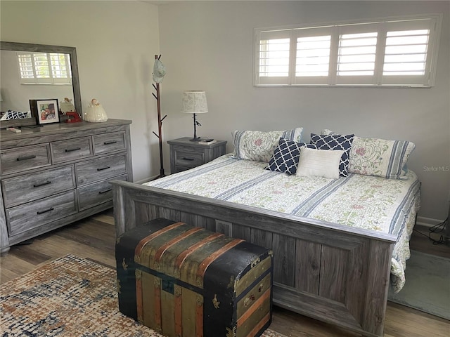 8533 SW 93rd Pl Unit A, Ocala, FL 34481 - bedroom featuring dark wood-style flooring
