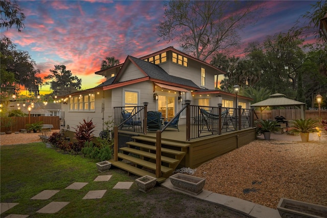 44 SE 9th Ter, Ocala, FL 34471 - view of front facade with a yard, a gazebo, fence, and a wooden deck