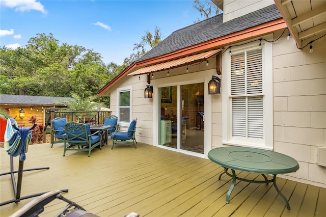 44 SE 9th Ter, Ocala, FL 34471 - wooden deck with outdoor dining space