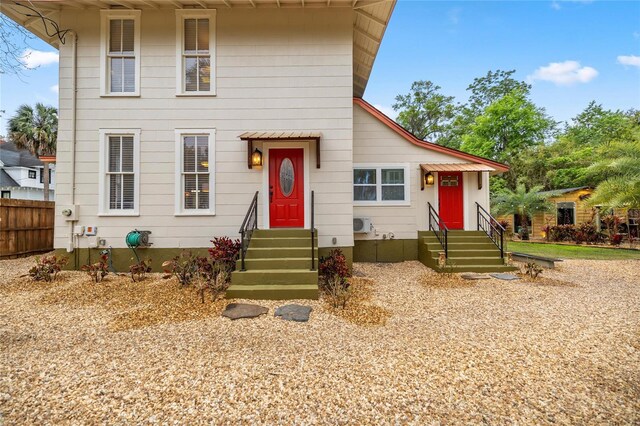 44 SE 9th Ter, Ocala, FL 34471 - view of front of home featuring fence and entry steps