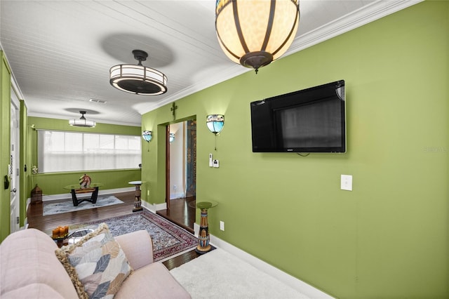44 SE 9th Ter, Ocala, FL 34471 - living room with visible vents, ornamental molding, baseboards, and wood finished floors