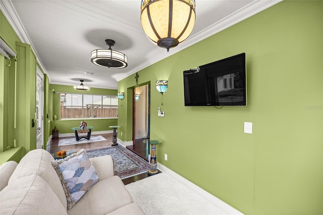 44 SE 9th Ter, Ocala, FL 34471 - living room with baseboards, ornamental molding, and wood finished floors