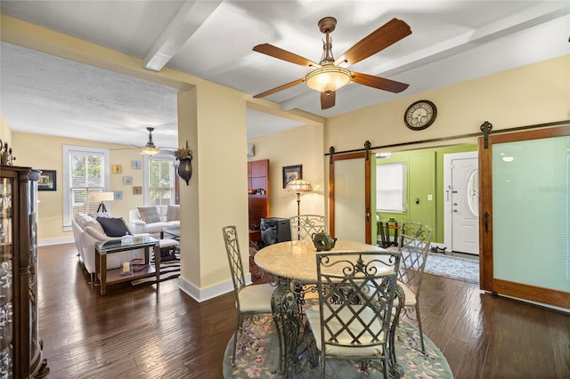 44 SE 9th Ter, Ocala, FL 34471 - dining room with dark wood-style flooring, baseboards, beam ceiling, a barn door, and ceiling fan