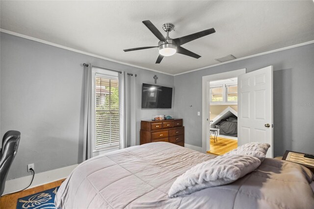 44 SE 9th Ter, Ocala, FL 34471 - bedroom featuring visible vents, ornamental molding, baseboards, and wood finished floors