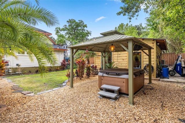44 SE 9th Ter, Ocala, FL 34471 - view of yard with a hot tub, fence, and a gazebo