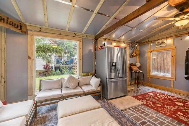 44 SE 9th Ter, Ocala, FL 34471 - unfurnished living room with baseboards, lofted ceiling, brick floor, and a ceiling fan