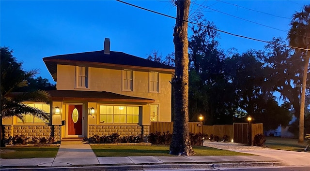 44 SE 9th Ter, Ocala, FL 34471 - view of front facade featuring a chimney, fence, and a porch