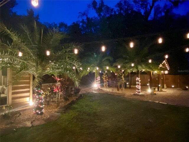 44 SE 9th Ter, Ocala, FL 34471 - yard at night featuring fence