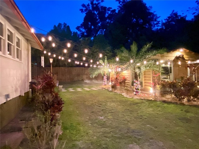 44 SE 9th Ter, Ocala, FL 34471 - yard at night featuring fence