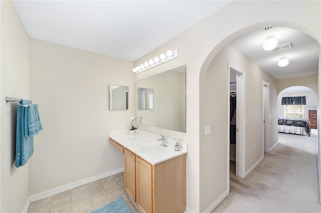 4545 SE 30th St, Ocala, FL 34480 - bathroom featuring baseboards, visible vents, and vanity