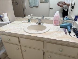 8665 SW 94th St Unit C, Ocala, FL 34481 - full bathroom with vanity and a shower