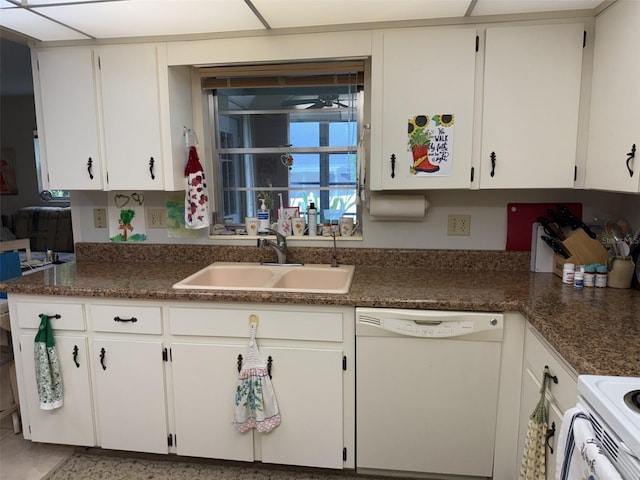 8665 SW 94th St Unit C, Ocala, FL 34481 - kitchen featuring white appliances and white cabinets