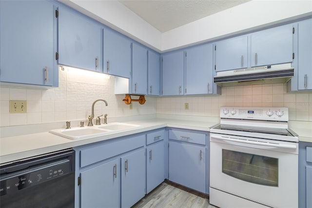 kitchen featuring a sink, blue cabinets, dishwasher, white range with electric cooktop, and under cabinet range hood