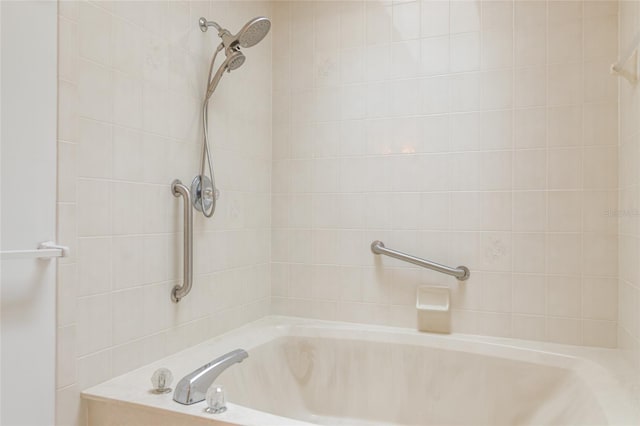 full bath featuring a bathing tub and walk in shower