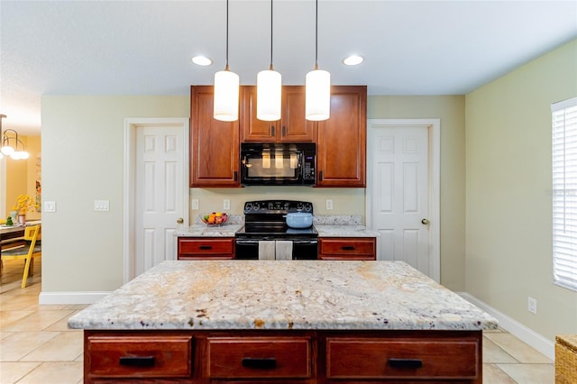 5770 SW 89th Pl, Ocala, FL 34476 - kitchen with black appliances, baseboards, a center island, and light stone countertops