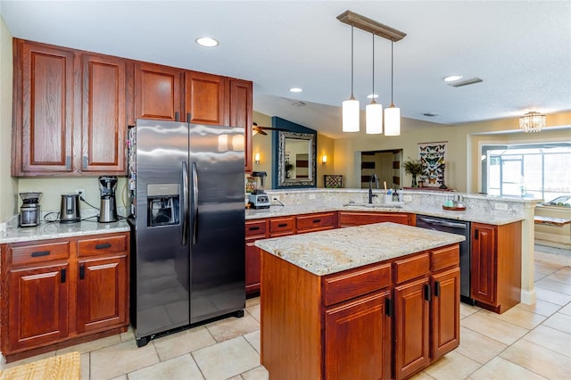 5770 SW 89th Pl, Ocala, FL 34476 - kitchen featuring a sink, pendant lighting, a peninsula, dishwashing machine, and stainless steel refrigerator with ice dispenser