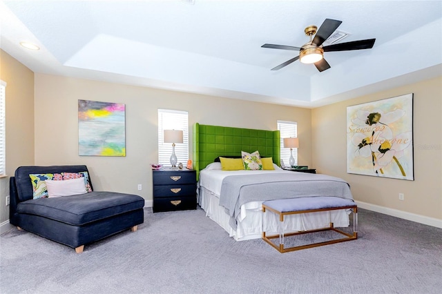 5770 SW 89th Pl, Ocala, FL 34476 - bedroom featuring ceiling fan, baseboards, carpet, and a raised ceiling