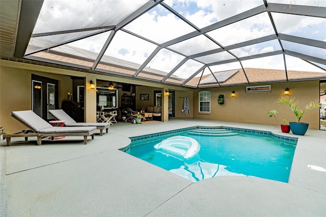 5770 SW 89th Pl, Ocala, FL 34476 - outdoor pool featuring glass enclosure, outdoor lounge area, and a patio