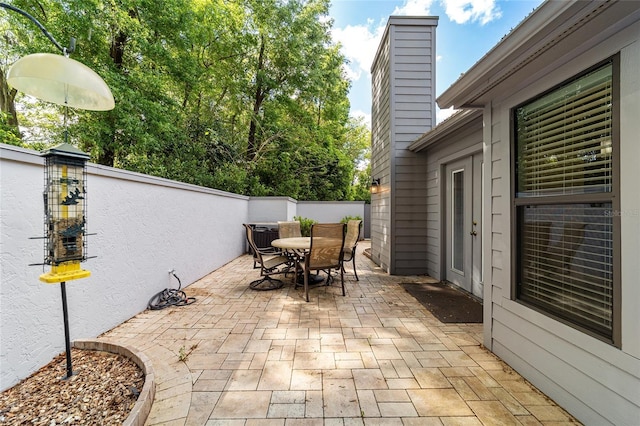 view of patio / terrace featuring a fenced backyard and outdoor dining area