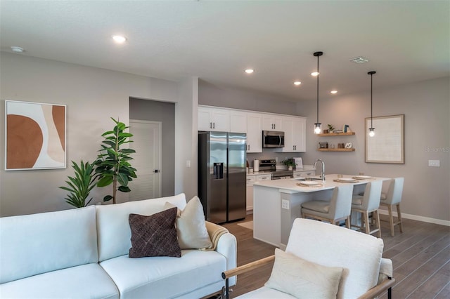 11555 SW 59th Ter, Ocala, FL 34476 - living room with wood finished floors and recessed lighting