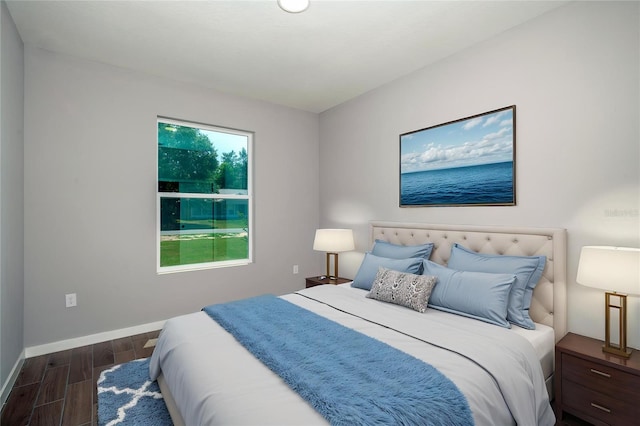 11555 SW 59th Ter, Ocala, FL 34476 - bedroom featuring dark wood-style floors and baseboards