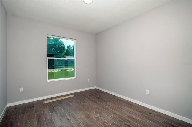 11555 SW 59th Ter, Ocala, FL 34476 - spare room featuring dark wood-type flooring