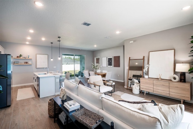 11555 SW 59th Ter, Ocala, FL 34476 - living area with light wood-type flooring and recessed lighting