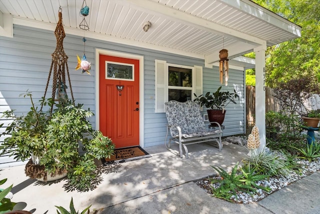 8570 N Discalfani Loop, Crystal River, FL 34428 - view of exterior entry featuring fence and a porch