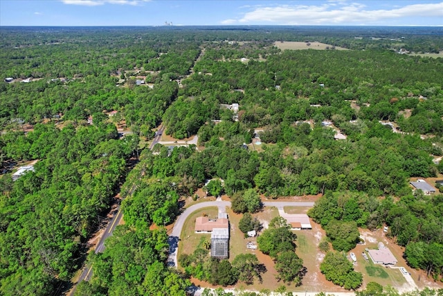 8570 N Discalfani Loop, Crystal River, FL 34428 - birds eye view of property with a wooded view
