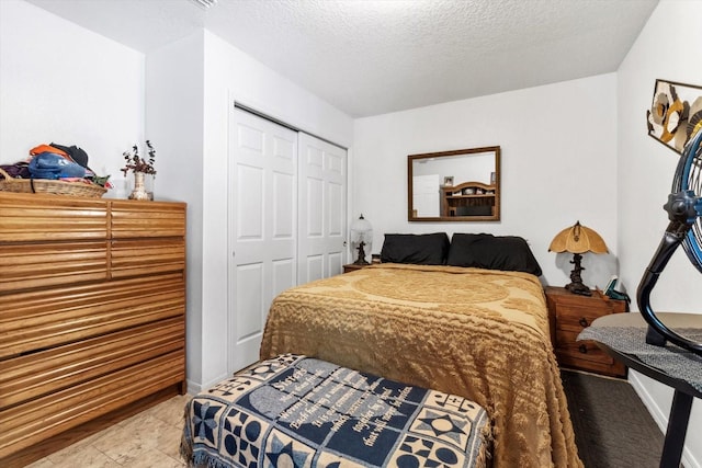 8570 N Discalfani Loop, Crystal River, FL 34428 - bedroom with a closet and a textured ceiling