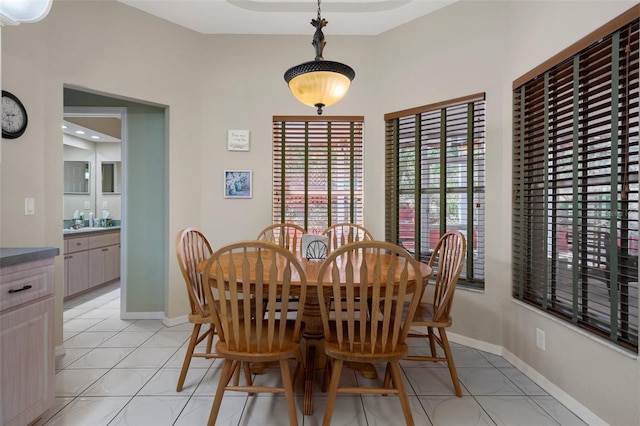 6 Statice Ct, Homosassa, FL 34446 - dining area with baseboards and light tile patterned flooring