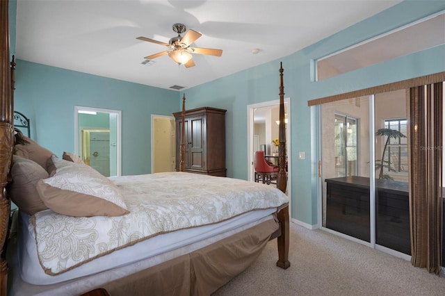6 Statice Ct, Homosassa, FL 34446 - carpeted bedroom featuring a ceiling fan, access to exterior, visible vents, and ensuite bathroom