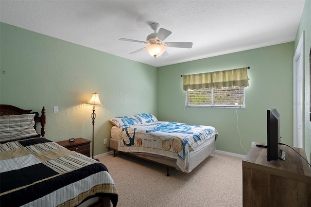 6 Statice Ct, Homosassa, FL 34446 - bedroom featuring carpet floors, a textured ceiling, baseboards, and ceiling fan