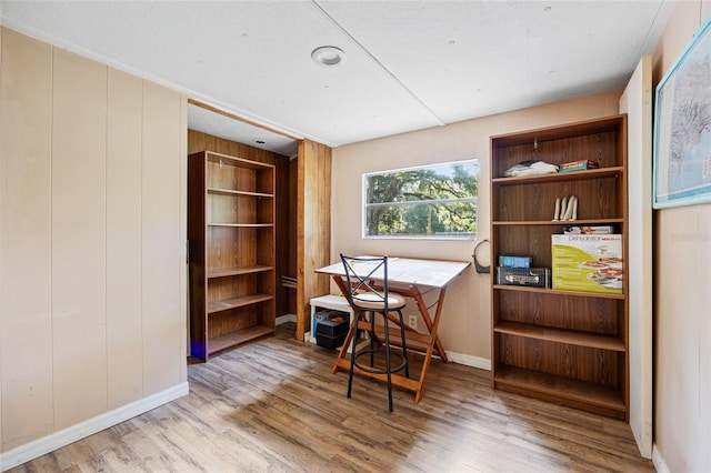 2780 County Road 575, Bushnell, FL 33513 - office area with baseboards, wood finished floors, and built in shelves