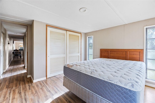 2780 County Road 575, Bushnell, FL 33513 - bedroom with baseboards, a closet, and wood finished floors