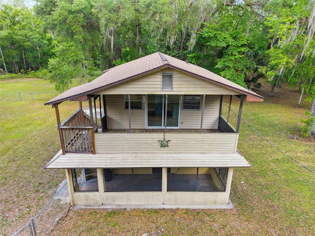2780 County Road 575, Bushnell, FL 33513 - exterior space with a view of trees, a deck, and a front lawn