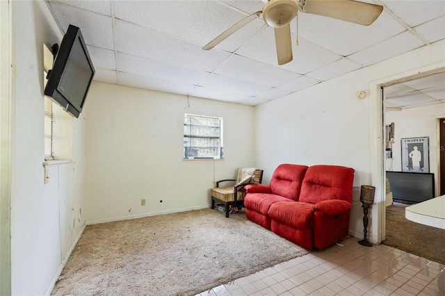 2780 County Road 575, Bushnell, FL 33513 - carpeted living area featuring baseboards, ceiling fan, and a drop ceiling