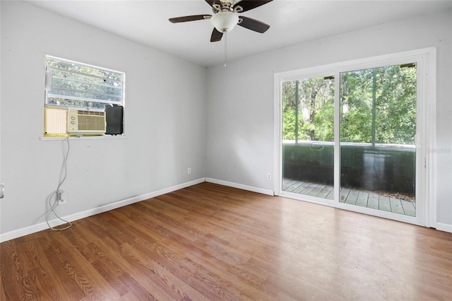 2780 County Road 575, Bushnell, FL 33513 - unfurnished room with baseboards, ceiling fan, cooling unit, and wood finished floors